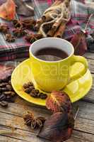 Black coffee in yellow cup