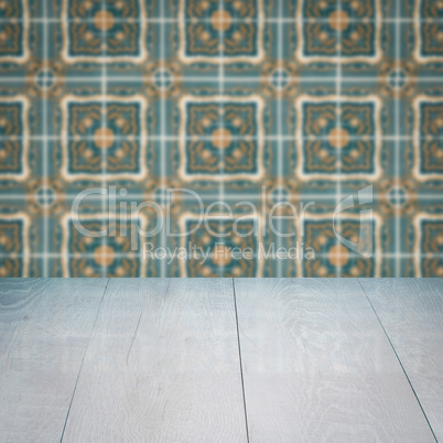 Wood table top and blur vintage ceramic tile pattern wall