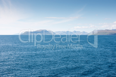 Landscape on the Faroe Islands as seen from a ship