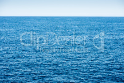 Blue ocean background with blue sky