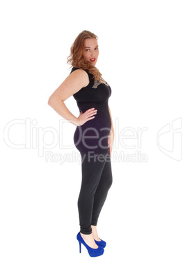 Woman standing in black tights.