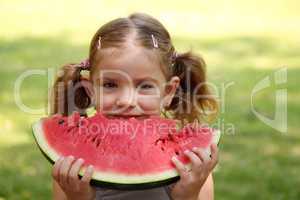 beauty little girl eat watermelon