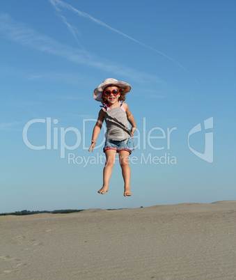 happy little girl high jump