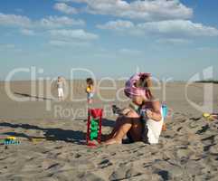 little girl playing with sand