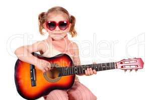 little girl with sunglasses and guitar