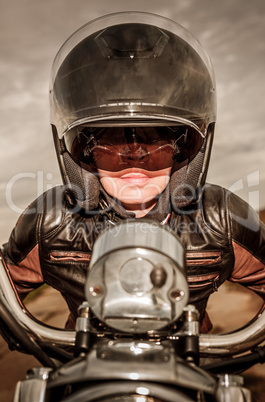 Biker girl on a motorcycle