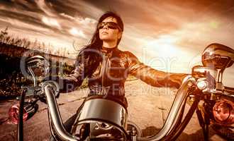 Biker girl on a motorcycle