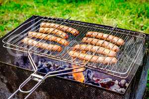 Grilling sausages