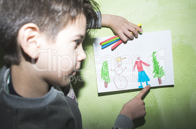 Child shows picture