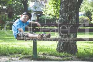 Little boy on a bench