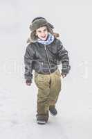 Child walking on the snow
