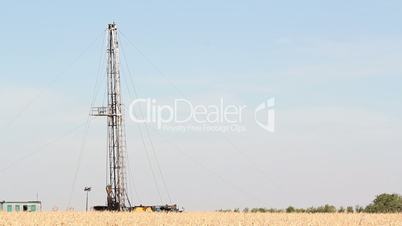 oilfield with oil drilling rig