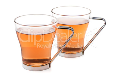 Two glass cups of black tea