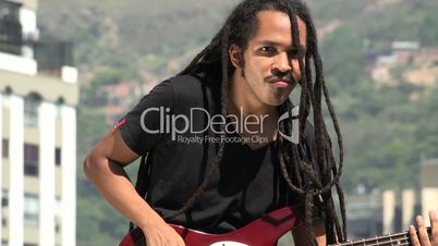 African Reggea Guitarist With Dreadlocks