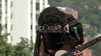 African Male Reggea Guitarist With Dreadlocks