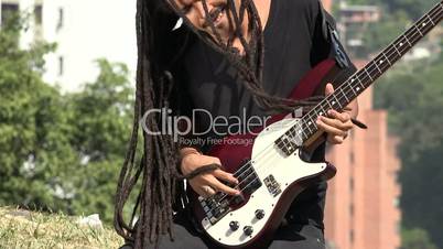 African Male Bass Guitarist With Dreadlocks