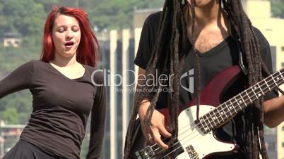 Woman Dancing With Guitarist