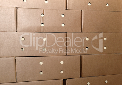 Cardboard packing boxes in a warehouse, background
