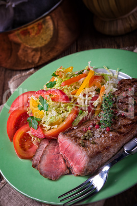 grilled steak with salad