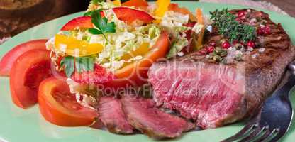 grilled steak with salad