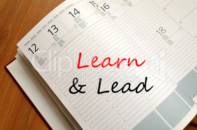 Learn & Lead write on notebook