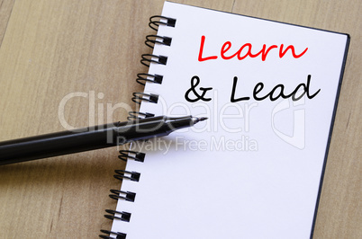 Learn & Lead write on notebook