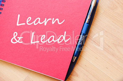 Learn & Lead write on notebook