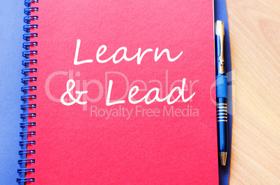 Learn & Lead write on notebook