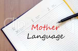 Mother language write on notebook