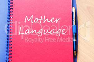 Mother language write on notebook