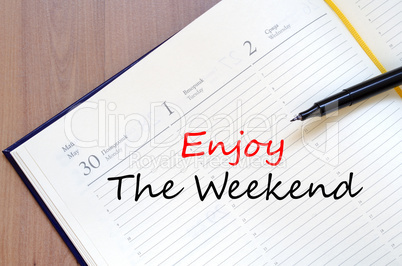 Enjoy the weekend write on notebook