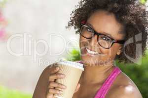 African American Woman In Glasses Drinking Coffee