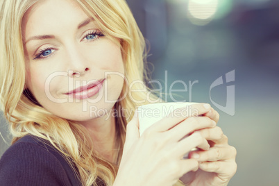 Instagram Style Photo of Blond Woman Drinking Coffee