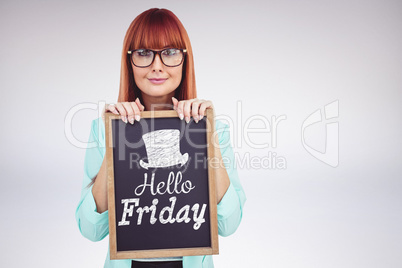 Composite image of smiling hipster woman holding blackboard