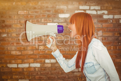 Composite image of side view of a hipster woman shooting through