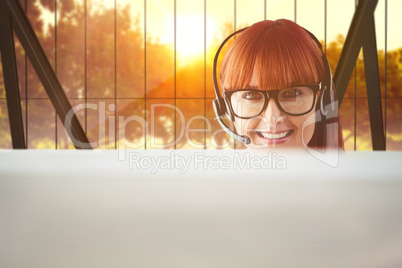 Composite image of attractive hipster woman with headset