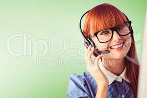 Composite image of attractive hipster woman with headset