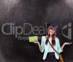 Composite image of smiling hipster woman with bag and book