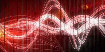 Composite image of curved laser light design in red