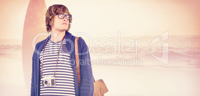 Composite image of thoughtful hipster looking away