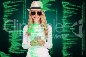 Composite image of gorgeous blonde hipster with sunglasses using