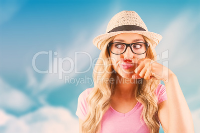 Composite image of a beautiful hipster having a fake mustache