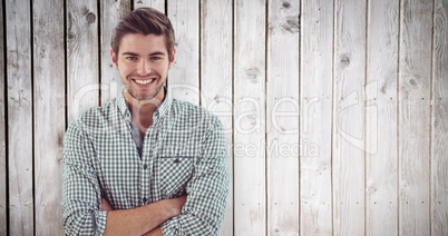 Composite image of smiling crestive business man