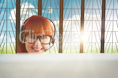 Composite image of attractive hipster woman with headset