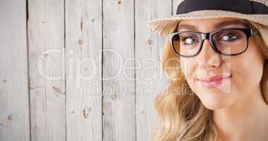 Composite image of gorgeous blonde hipster smiling