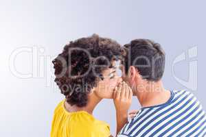 Composite image of couple whispering in ear