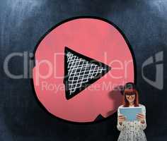 Composite image of smiling hipster woman using her tablet