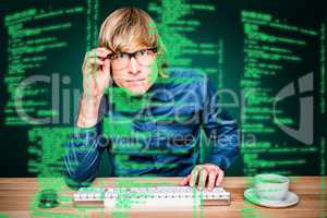 Composite image of focused hipster businessman using computer