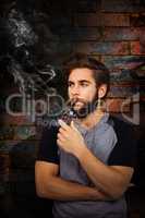 Composite image of confident hipster smoking pipe