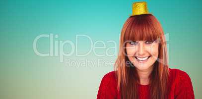 Composite image of smiling hipster woman with party hat